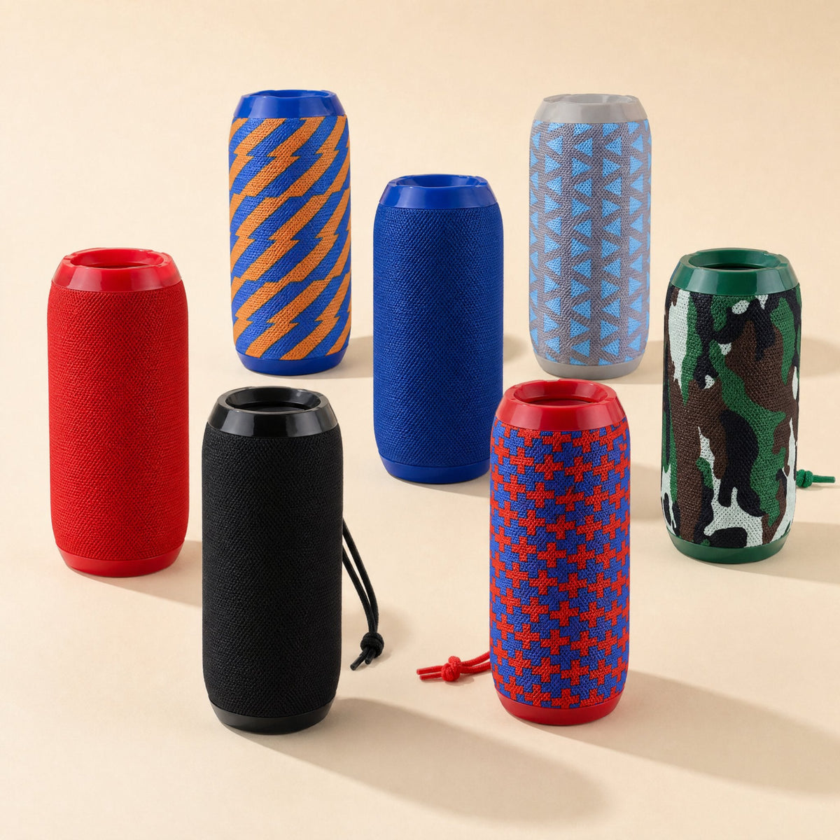 Rainbeat Waterproof Bluetooth Speaker in seven fabric finishes: red, black, blue, camo and patterned designs
