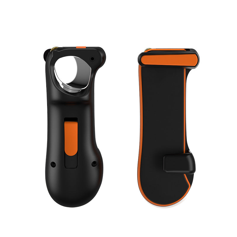 Tapwing – Front and back views of a single black and orange game controller trigger with a ring opening and clip