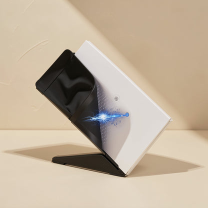 Dustmesh – Black magnetic dust filter peeling away from a white panel, with a blue spark graphic at the edge