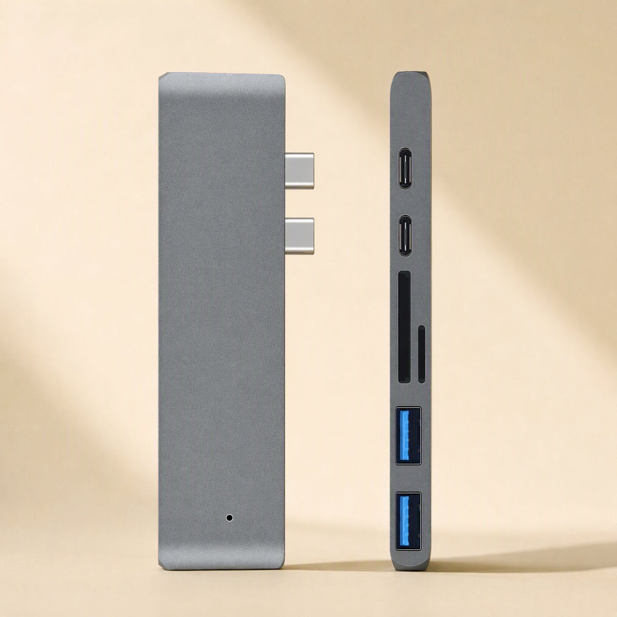 Linkdock – Front and side views of the grey dock showing dual USB-C connectors, card slots and blue USB-A ports