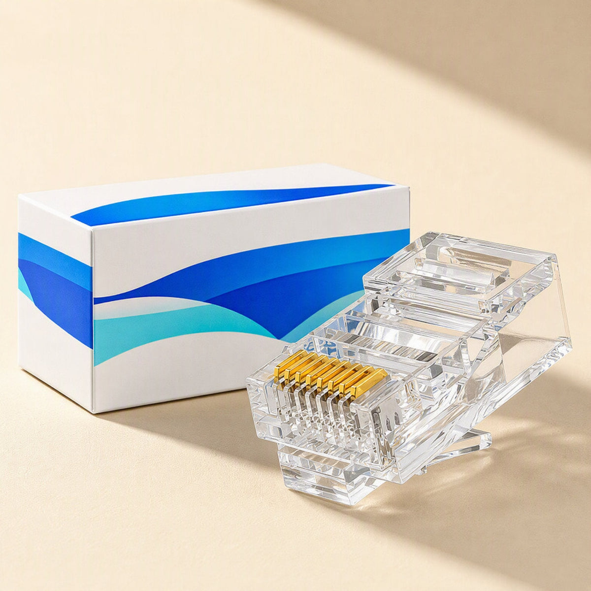 Netclick Cat6 RJ45 crystal head connector with gold contacts beside a white box with blue wave design