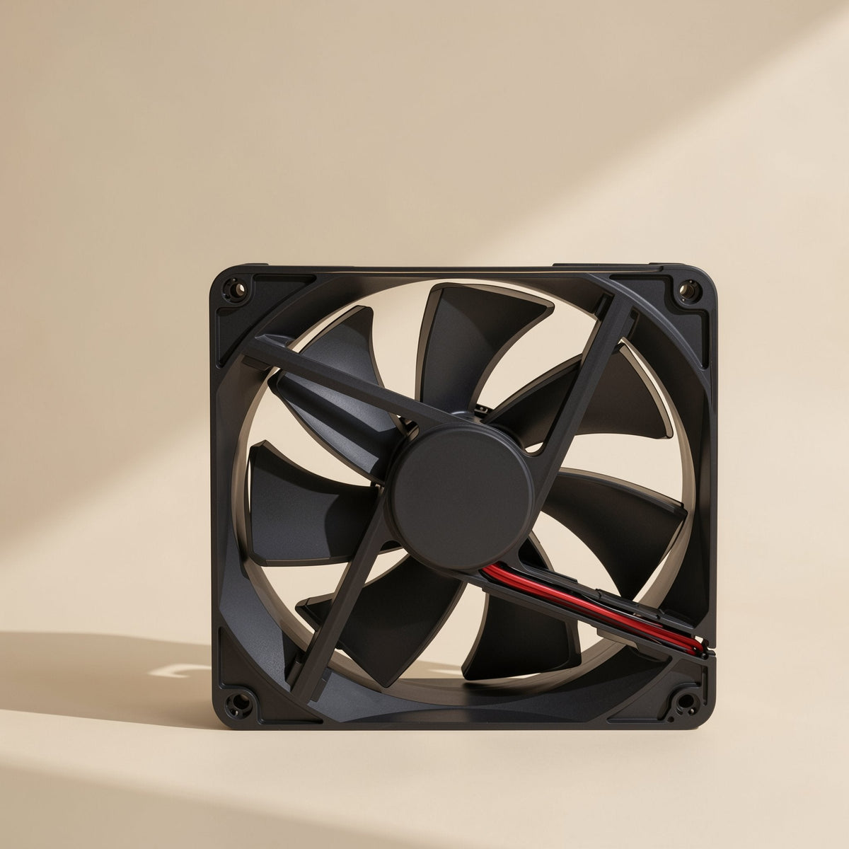 Bladechill 7-Blade PBT Cooling Fan, black square frame, front view with red and black wires on a cream backdrop