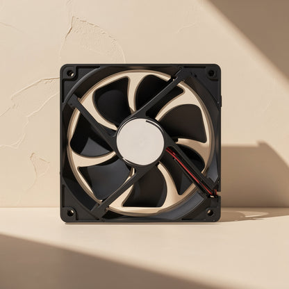 Chillspin – Rear view of the fan showing the pale round hub, support spokes and red and black cable, against a textured wall