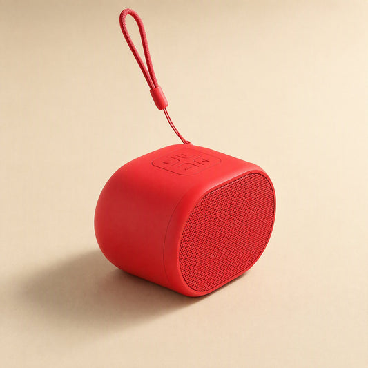 Beatburst Bluetooth Speaker – red speaker with fabric grille and loop strap, angled view showing top control buttons