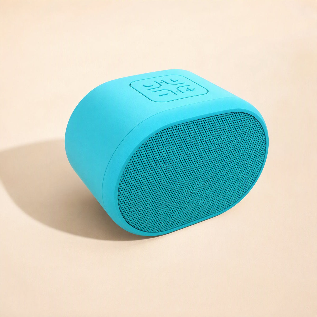 Beatburst Bluetooth Speaker – blue speaker front three-quarter view with mesh grille and raised control buttons on top