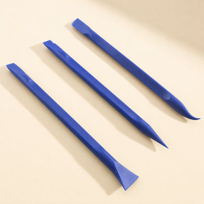 Prywise – Three blue pry tools showing pointed, flat and curved hooked ends, angled on a cream background