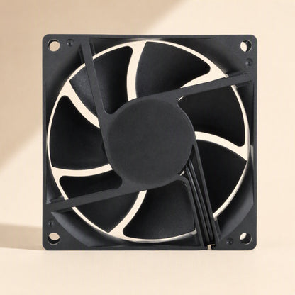 Casecool – Rear view of the fan showing three support struts, central motor hub and wire channel on the black frame