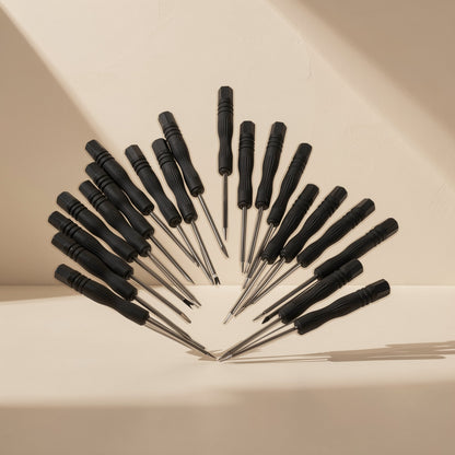 Screwbit Blackhead Mobile Phone Screwdriver set fanned out in a half-circle on a cream background