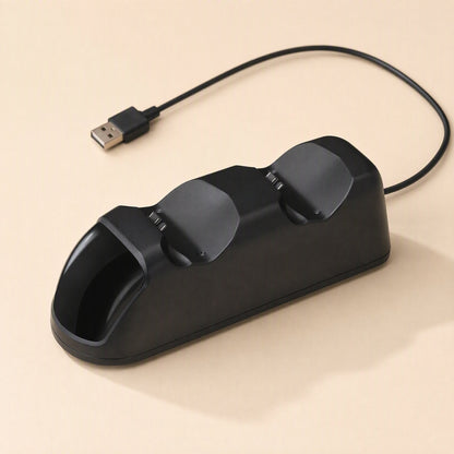 Padcharge PS4 Dual Gamepad Charging Dock – empty black dock from above with two charging slots and a USB cable plugged in