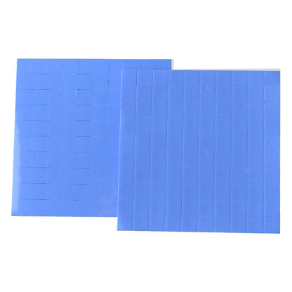 Gapflow – Two blue grid-cut thermal pad sheets standing side by side against a white background