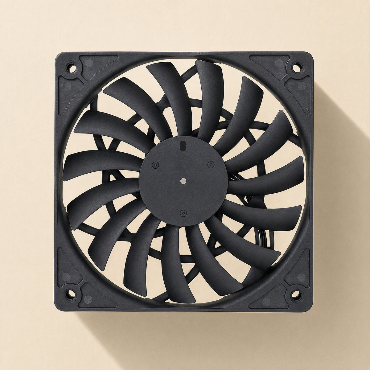Airframe Chassis Cooling Fan, black slim frame with curved blades, front view on cream background