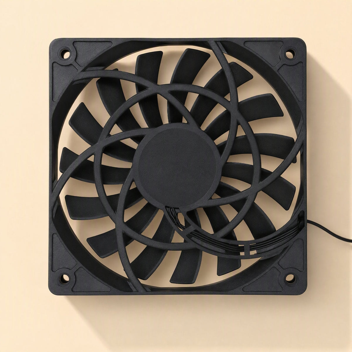 Airframe – Rear view of the fan showing curved support spokes, central hub and a thin black cable at lower right