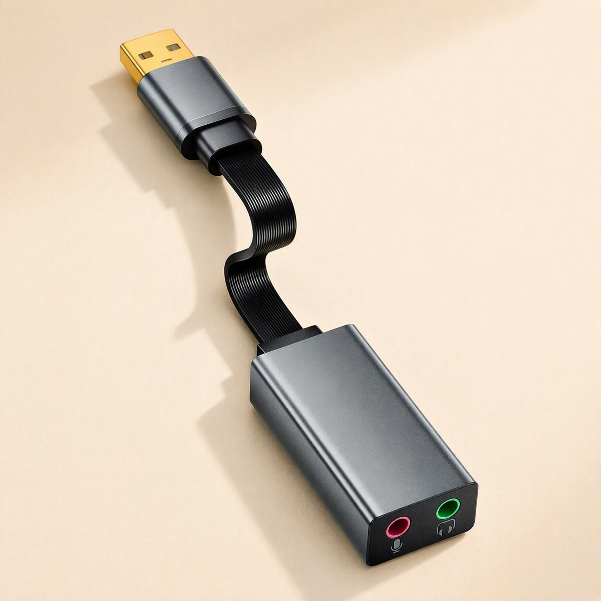 Twintone USB Sound Card – gray dual-jack sound card with flat black cable curved in an S shape, gold USB plug at top left