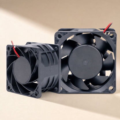 Windcraft DC Cooling Fan, dual ball bearings, two black square fans angled together with red and black wires