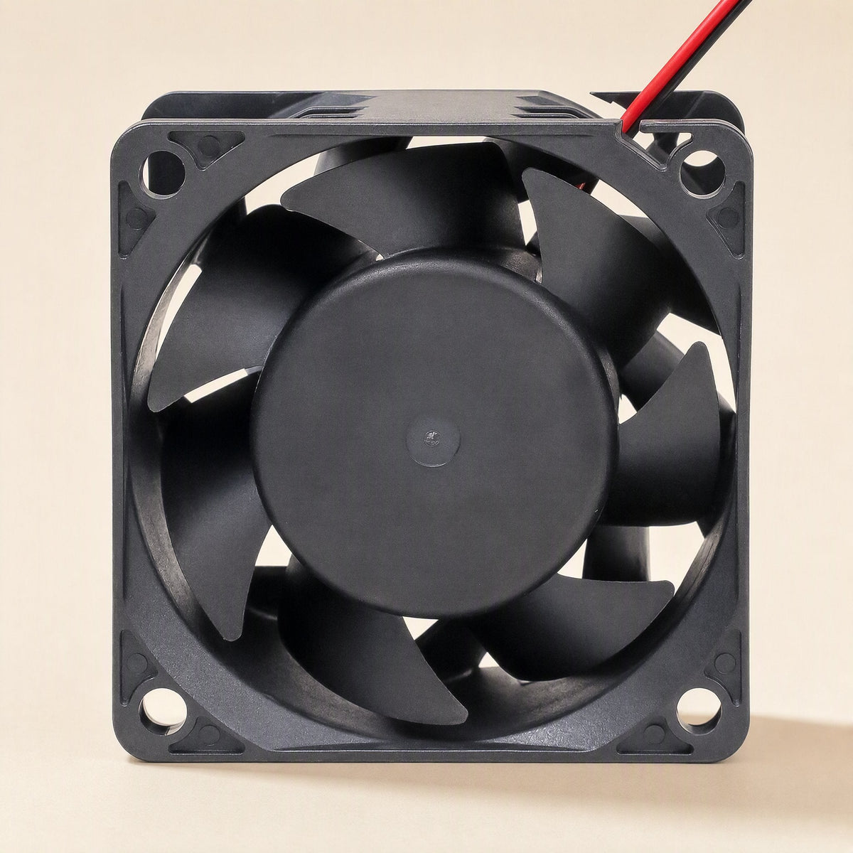 Windcraft DC Cooling Fan – front view of a square black cooling fan showing seven curved blades and a round central hub