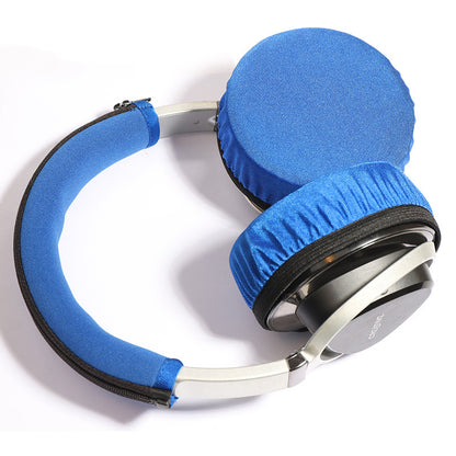 Earflex – Blue ear cup covers and headband cover fitted on over-ear headphones, with zipper edge visible