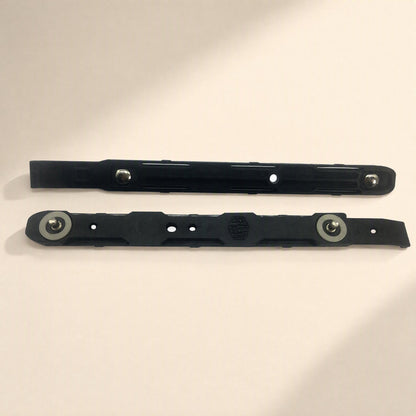 Coolbrace Hard Drive Bracket pair in black plastic with metal pins, laid flat on a cream background