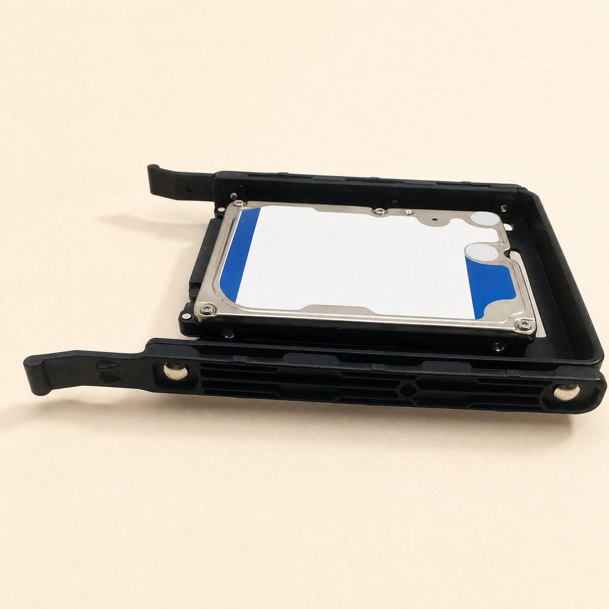 Coolbrace Hard Drive Bracket – side view of a 2.5-inch drive held in a black tray with side rails and release tabs