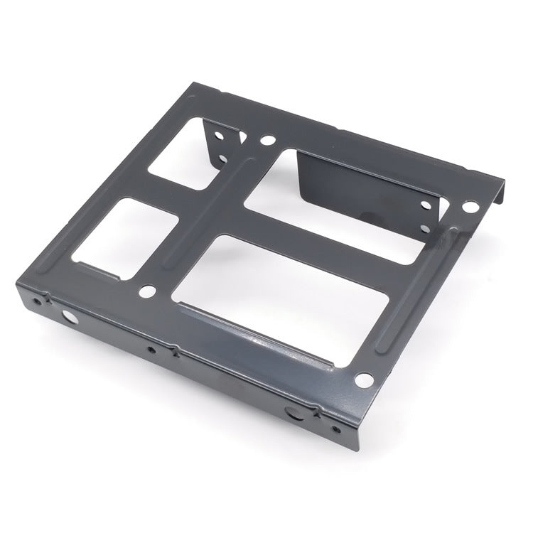 Storbit – Gray metal dual-bay drive bracket seen from above at an angle, with cutouts and mounting holes