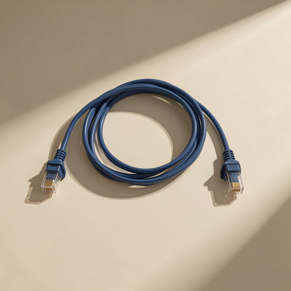 Twistline – Blue network cable in a single loop with RJ45 connectors at both ends, seen from above