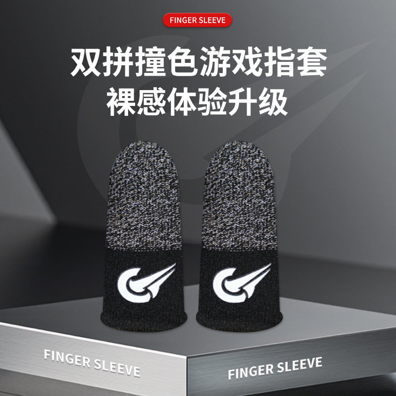 Tapstrike Copper Fiber Gaming Finger Sleeves, a black pair with speckled grey tips on a grey display block