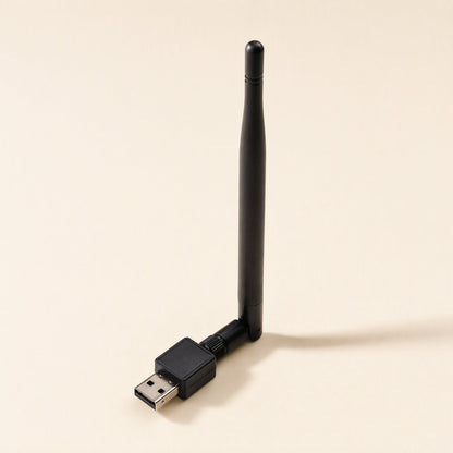 Netplug – Black USB wireless adapter with antenna angled up, seen from the front on a beige background