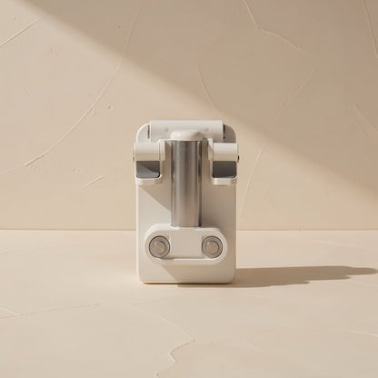 Deskease – Front view of the folded holder showing the metal column, hinge and two round pivot buttons
