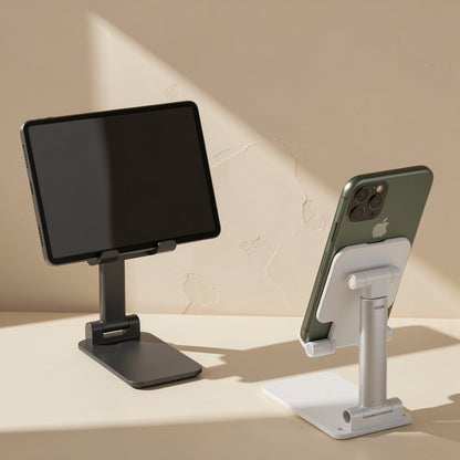 Deskease Alloy Desktop Phone Holder – black holder with a tablet beside a white holder with a green phone seen from the back