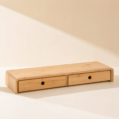 Bamboorise Bamboo Computer Monitor Stand with two small drawers with round finger holes, angled view