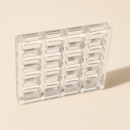 Switchframe – Four-column clear acrylic switch tester frame with six rows of slots, tilted to show its thickness