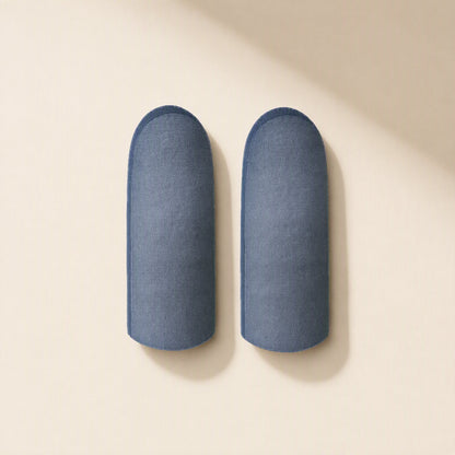Silvertouch – Two blue-gray finger sleeves lying flat side by side on a cream background, seen from above