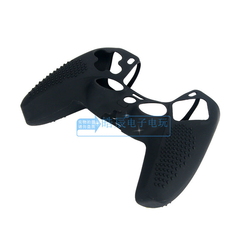 Speckcase – Black silicone case seen at an angle, with textured dots on the grip and openings for sticks and buttons