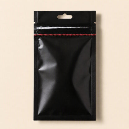 Meltlink – Front of a black resealable pouch with hang hole and red striped seal, on a plain beige background