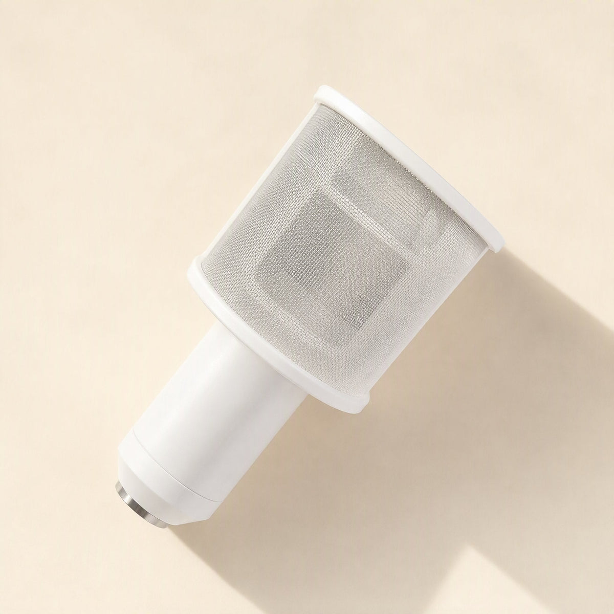 Curvecatch U-Shaped Microphone Pop Filter – white mesh pop filter wrapped around a white microphone, seen from an angle