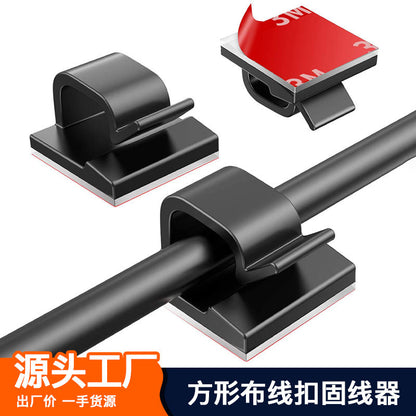 Wiretidy Desktop Cable Organizer Clamp, two black clips with 3M adhesive backing holding a cable