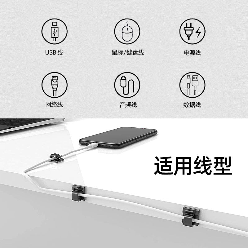 Wiretidy – Cable clips on a desk edge holding a phone charging cable, with icons for USB, mouse, power and audio cords
