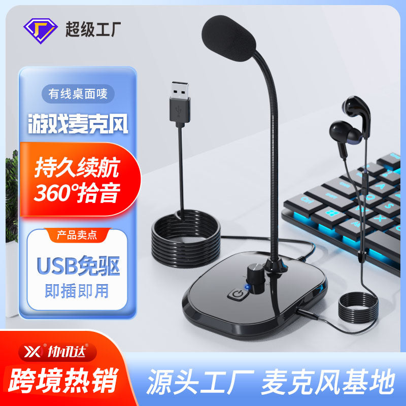 Reclyn USB Capacitor Computer Microphone on a black base with earbuds beside a backlit keyboard