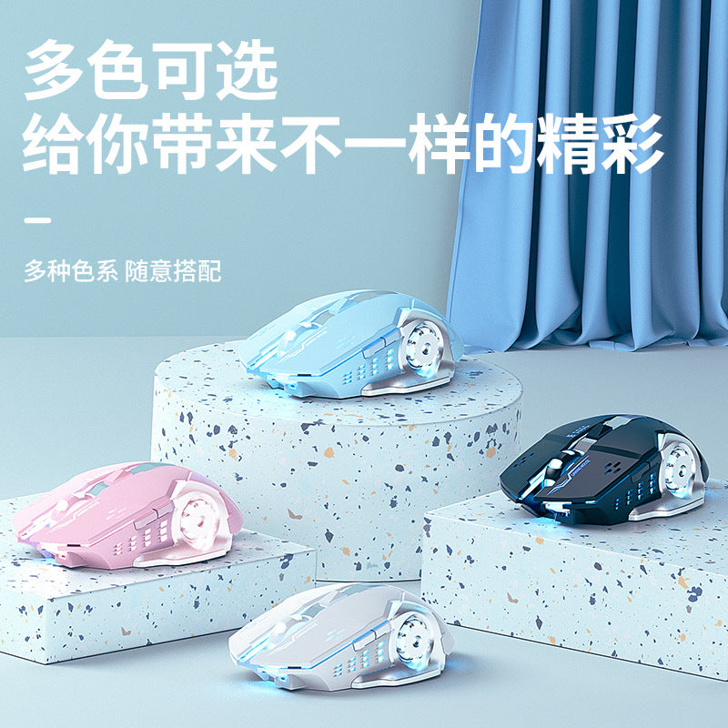 Quicktail – Four gaming mice in blue, pink, white and black on speckled display blocks in front of a blue curtain