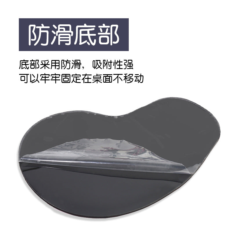 Wristlune Silicone Wrist Mouse Pad – underside of the black non-slip base with a clear protective film being peeled back