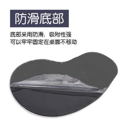 Wristlune Silicone Wrist Mouse Pad – underside of the black non-slip base with a clear protective film being peeled back