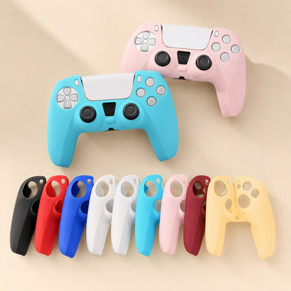 Padshield – Blue and pink PS5 controllers with silicone covers above nine covers in black, red, blue, white, pink, yellow