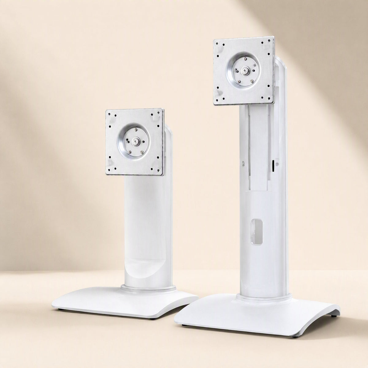 Viewlift Aluminum Alloy Monitor Stand in white, a short and a tall version side by side on a cream backdrop