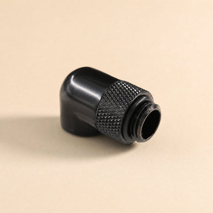 Swivelbend – Black 90-degree rotating fitting from the rear, showing the smooth curved body and knurled swivel ring