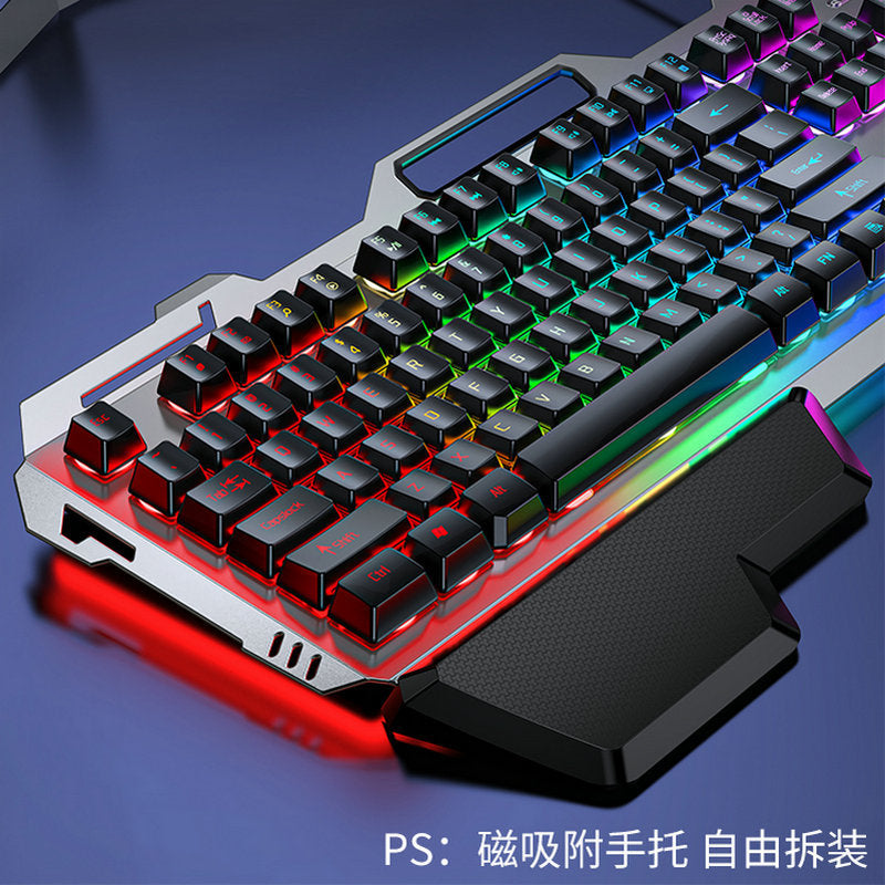 Keyforge – Close-up of keyboard's left side showing red-lit keys, brushed metal frame and magnetic black palm rest