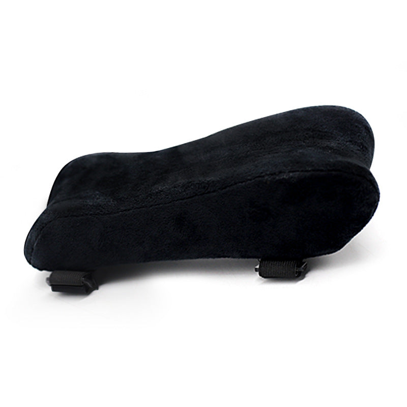 Nestglove – Side view of the black velvet armrest pad with curved top and two black straps on a white background