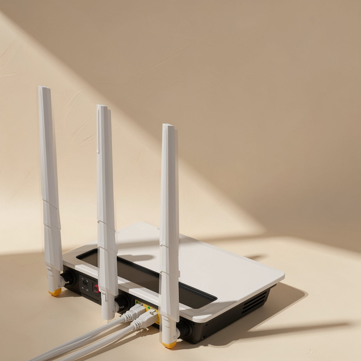 Pairpath Cat6 Ethernet Cable – white Wi-Fi router with three antennas and two Ethernet cables plugged into its back ports