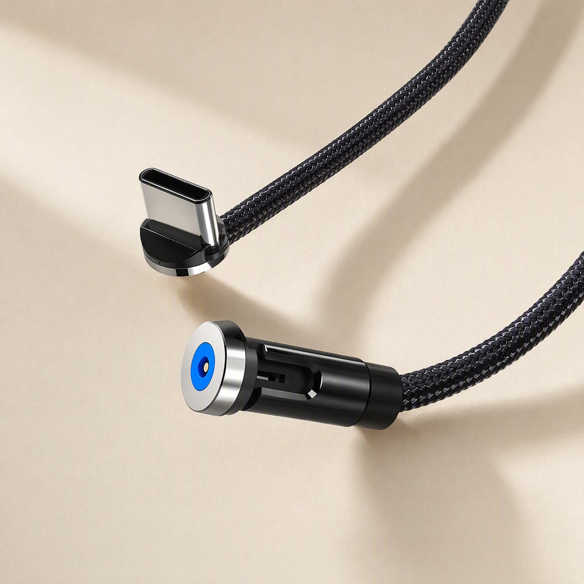 Snapcharge – Black woven cable with a right-angle USB-C tip and a magnetic head with blue center