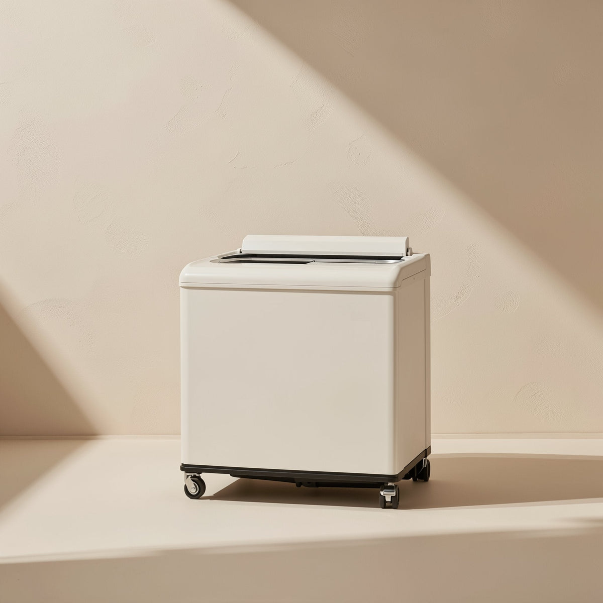 Casebolt – White cabinet on small black wheels with a lidded top, shown on a beige background