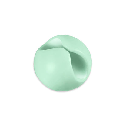 Cordscape – Single mint green round winding clip with a curved cable slot, shown on a plain white background