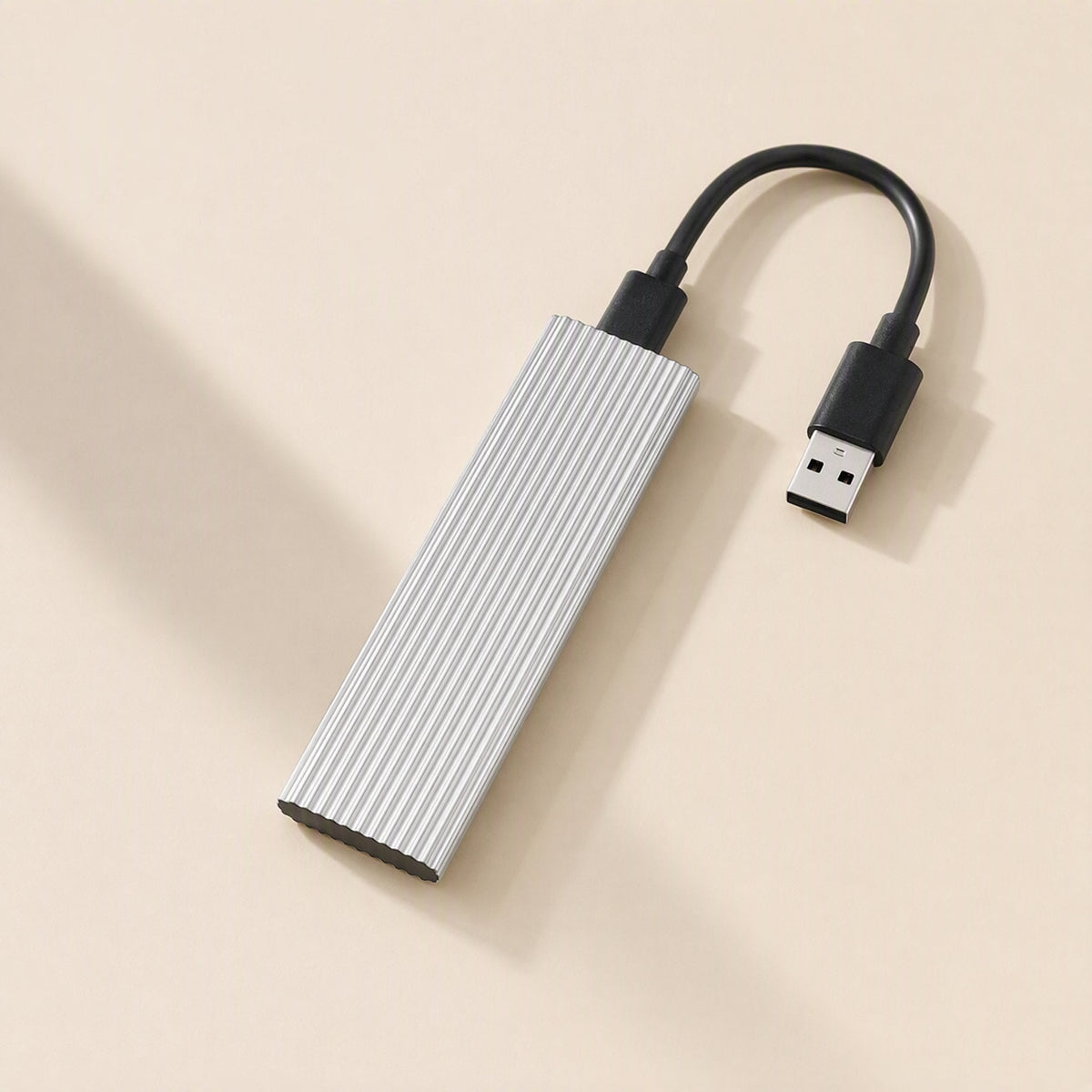Ministore Mini Metal External Solid State Drive – silver ribbed drive with a short black cable ending in a USB-A connector